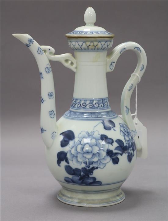 A 19th century Chinese blue and white ewer and cover height 25cm